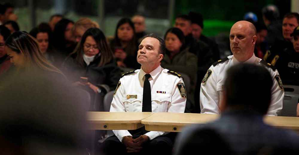 PHIL HOSSACK / WINNIPEG FREE PRESS
City Police Chief Danny Smyth waits his turn to address the crowd at the Maples Collegiate Friday.