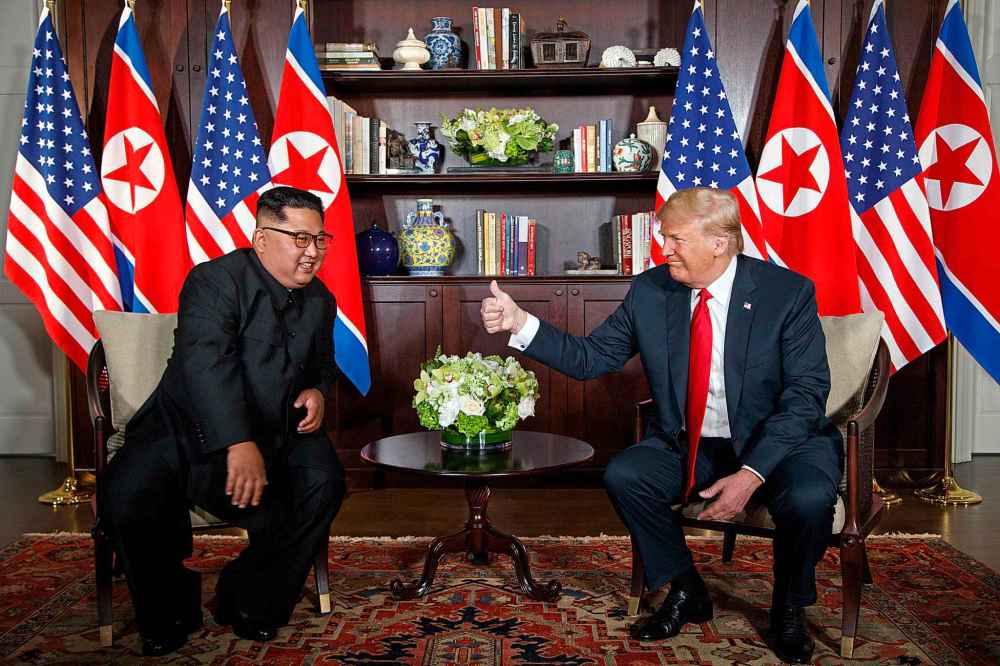 President Donald Trump meets with North Korean leader Kim Jong Un on Sentosa Island in Singapore. (AP Photo/Evan Vucci)