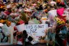 In this Saturday, March 16, 2019, file photo, flowers lay at a memorial near the Masjid Al Noor mosque for victims in last week's shooting in Christchurch, New Zealand. The leafy New Zealand city where a self-proclaimed racist fatally shot 50 people at mosques during Friday prayers is known for its picturesque meandering river and English heritage. For decades, the southern city of Christchurch also has been the center of the country's small but persistent white supremacist movement. (AP Photo/Vincent Yu, File)