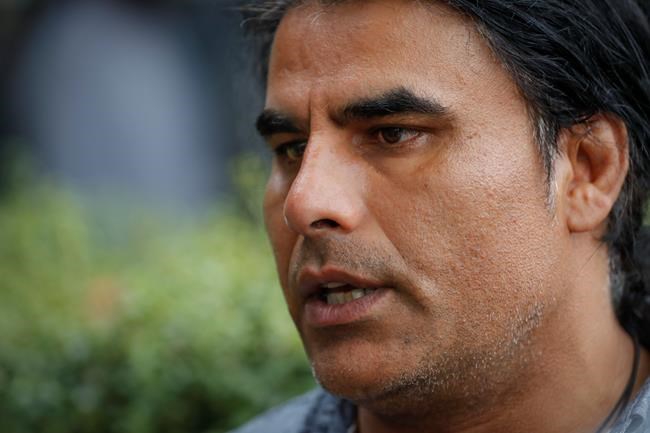 Abdul Aziz, survivor of mosque shooting speaks to Associated Press during an interview in Christchurch, New Zealand, Saturday, March 16, 2019. Aziz, 48, is being hailed as a hero for preventing more deaths during Friday prayers at the Linwood mosque in Christchurch. The gunman killed 49 people after attacking two mosques in the deadliest mass shooting in New Zealand’s modern history. Seven were killed at the Linwood mosque. (AP Photo/Vincent Thian)