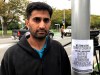 Yasir Amin, 35-year-old, describes his run-in with the gunman in Friday's mass shootings Saturday, March 16, 2019, in Christchurch, New Zealand. (AP Photo/Kristen Gelineau)