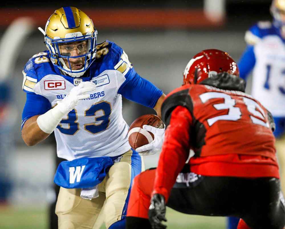 THE CANADIAN PRESS/Jeff McIntosh
Winnipeg Blue Bombers' Andrew Harris, left, on the Calgary Stampeders: 