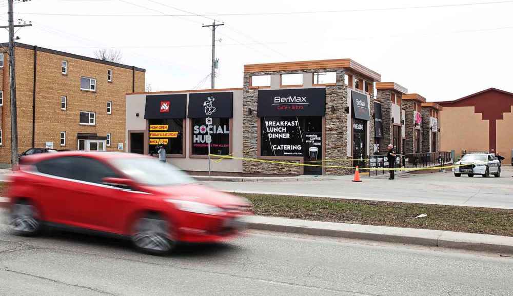 MIKE DEAL / WINNIPEG FREE PRESS
Winnipeg Police investigate at BerMax Caffé and Bistro Friday afternoon. A woman was assaulted and the restaurant she was working in was the target of hate-related vandalism and a robbery on Thursday night say police.