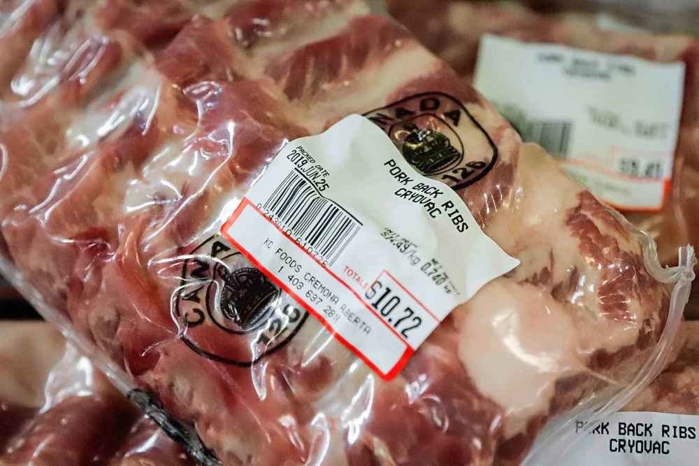 Jeff McIntosh / The Canadian Press files
China announced a temporary ban on all Canadian meat late Tuesday.
