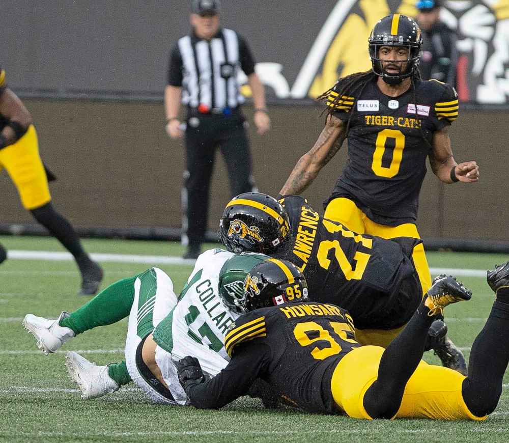 THE CANADIAN PRESS/Peter Power
Collaros was hit in the head by Hamilton Tiger-Cats' Simoni Lawrence during the first half of a game in June. Lawrence and Collaros, now playing for the Winnipeg Blue Bombers, will square off Sunday in the Grey Cup.