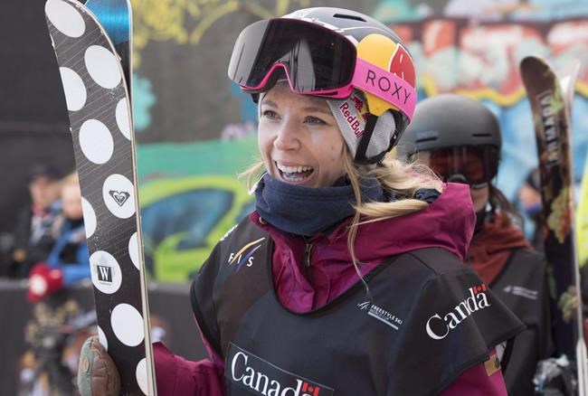 Canada's Dara Howell of Huntsville Ont.smiles as she celebrates her victory at the big air freeski world cup finale, Saturday, March 24, 2018 in Quebec City. Howell has rediscovered her drive and passion for freestyle skiing. THE CANADIAN PRESS/Jacques Boissinot