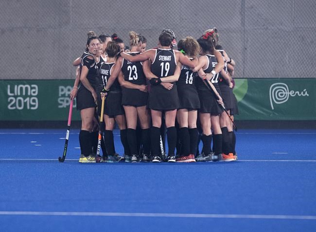 Canada's women's field hockey team huddles after their 5-1 loss to Argentina in the gold medal game at the Pan Am Games in Lima, Peru on August 9, 2019. The Canadian men's field hockey team has booked its ticket to the Tokyo Olympics. Now it's the women's turn. Like the men, the women have Ireland standing in their way, with a two-legged playoff this weekend. But unlike the men, the women will have to win on the road in Dublin --- after having to raise the required money to get there. THE CANADIAN PRESS/Andrew Vaughan