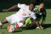 Mexico goalkeeper Gibran Lajud (1) defends against Canada forward Hanson Boakai (17) during the first half of a CONCACAF men's Olympic Semifinals soccer match on October 10, 2015, in Sandy, Utah. Mexico won 2-0. THE CANADIAN PRESS/AP-Rick Bowmer