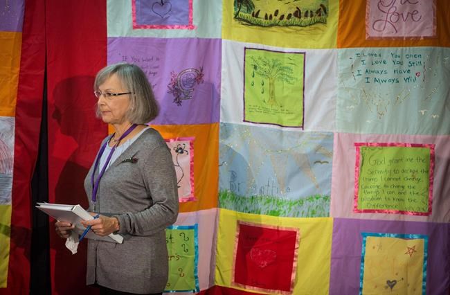 Chief commissioner Marion Buller listens before the start of hearings at the National Inquiry into Missing and Murdered Indigenous Women and Girls, in Smithers, B.C., on September 26, 2017. The long-awaited inquiry into missing and murdered Indigenous women has publicly released its findings including calls for health service providers to develop education programs for Indigenous children and youth on the issue of grooming for exploitation. THE CANADIAN PRESS/Darryl Dyck
