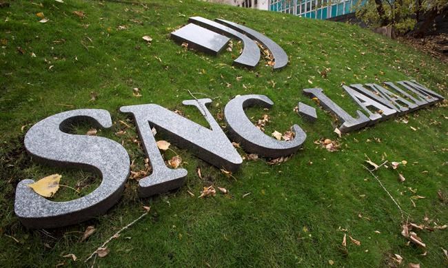 The front lawn of the headquarters of SNC Lavalin is seen Thursday, November 6, 2014 in Montreal. SNC-Lavalin Group Inc. is considering a lawsuit against Chile's state-owned copper mining company, which has terminated its contract with the construction giant. A spokesman for SNC-Lavalin tells The Canadian Press it is looking at all options to determine whether to take legal action. THE CANADIAN PRESS/Paul Chiasson