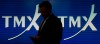 A man works in the TMX broadcast centre in Toronto, May 9, 2014. THE CANADIAN PRESS/Darren Calabrese