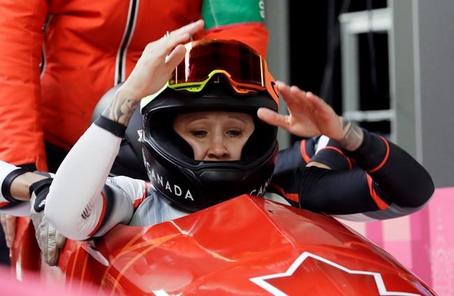 Driver Kaillie Humphries and Phylicia George of Canada celebrate after their bronze medal winning final heat during the women's two-man bobsled final at the 2018 Winter Olympics in Pyeongchang, South Korea, Wednesday, Feb. 21, 2018. THE CANADIAN PRESS/AP-Wong Maye-E