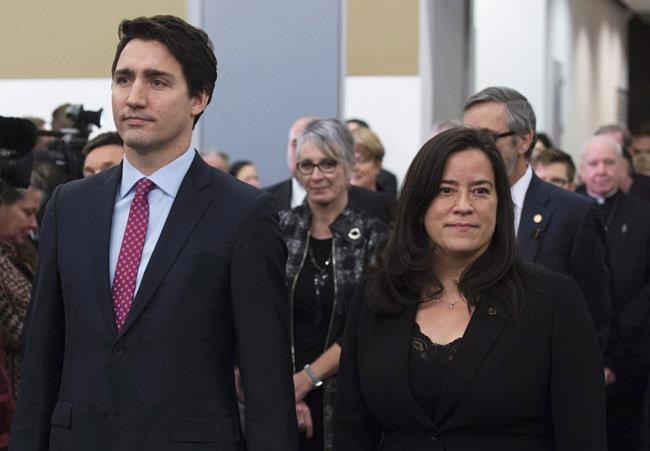 Prime Minister Justin Trudeau and Minister of Justice and Attorney General of Canada Jody Wilson-Raybould take part in the grand entrance as the final report of the Truth and Reconciliation commission is released, Tuesday December 15, 2015 in Ottawa. Veterans Affairs Minister Jody Wilson-Raybould is quitting the federal cabinet days after allegations became public the Prime Minister's Office pressured the former justice minister to help SNC-Lavalin avoid criminal prosecution. THE CANADIAN PRESS/Adrian Wyld