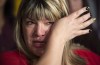 Bernadette Smith, from Winnipeg, wipes away tears as she talks about the Missing and Murdered Indigineous Women inquiry Tuesday, Dec. 8, 2015 on Parliament Hill in Ottawa. Indigenous women and families across the country watched anxiously as the national inquiry's final report was released during a ceremony and news conference in Gatineau, Que., Monday morning. Many said there would only be justice if sharing their stories of tragedy and loss led to real change. THE CANADIAN PRESS/Adrian Wyld