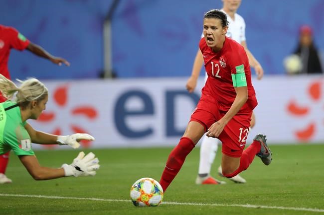 Canada's Christine Sinclair, right, tries a shoot during the Women's World Cup Group E soccer match between Canada and New Zealand in Grenoble, France, Saturday, June 15, 2019. THE CANADIAN PRESS/AP, Francisco Seco