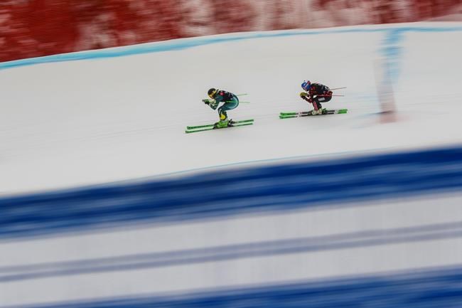 Sami Kennedy-Sim, left, of Australia, leads Mikayla Martin, right, of Canada, in practice for the women' ski cross event at the freestyle ski and snowboard world championships Saturday, Feb. 2, 2019, in Solitude, Utah. Canadian ski cross racer Mikayla Martin has died following a mountain bike accident in her hometown of Squamish, B.C. THE CANADIAN PRESS/AP/Alex Goodlett