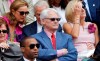 Canada's High Commissioner to London Gordon Campbell, center, sits in the Royal Box on centre court prior to the women's singles final between Eugenie Bouchard of Canada and Petra Kvitova of the Czech Republic at the All England Lawn Tennis Championships in Wimbledon, London, Saturday July 5, 2014. A British newspaper says police in London are investigating an allegation of sexual assault made against former British Columbia premier Gordon Campbell. THE CANADIAN PRESS/AP-Sang Tan