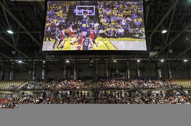 Fans watch the Toronto Raptors take on the Golden State Warriors during game 6 of the NBA Finals, in Edmonton on Thursday, June 13, 2019. The Toronto Raptors' historic championship-clinching win will go down in the Canadian television record books. THE CANADIAN PRESS/Jason Franson