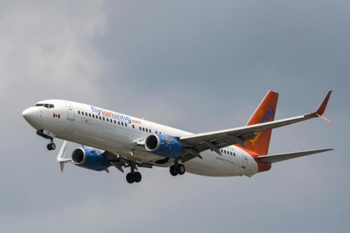 A Sunwing Boeing 737-800 passenger plane prepares to land at Pearson International Airport in Toronto on Wednesday, August 2, 2017. Transport Minister Marc Garneau faced an escalating dilemma Tuesday over Boeing's 737 Max 8 aircraft, which a growing number of countries have grounded or banned in the wake of the Ethiopian Airlines crash that killed 157 people Sunday. THE CANADIAN PRESS/Christopher Katsarov