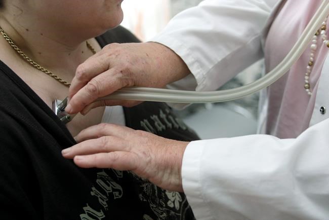 A doctor checks a patient with a stethoscope in Stuttgart, Germany, Monday, April 28, 2008. Ontario's highest court is expected to rule today on whether doctors in the province are obligated to give referrals for medical services that clash with their moral or religious beliefs.THE CANADIAN PRESS/AP/Thomas Kienzle