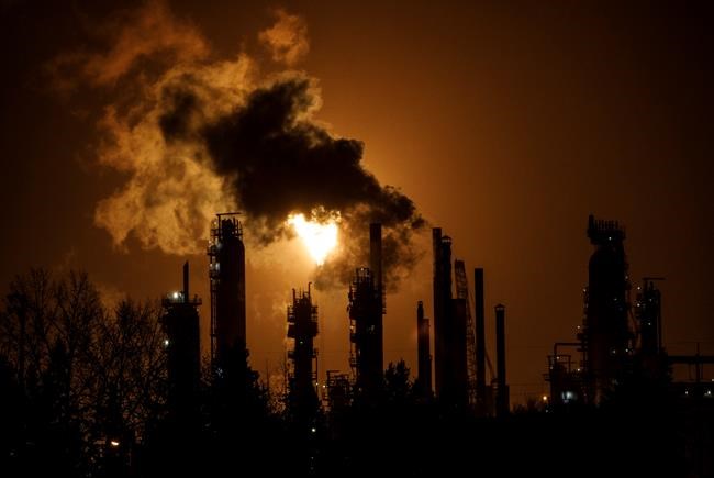 A flare stack lights the sky from the Imperial Oil refinery in Edmonton on December 28, 2018. A group with roots in the oil and gas industry is encouraging women to talk about politics this fall, even if they hold widely different views. The non-profit organization, called Canada Powered by Women, registered as a third-party advertiser with Elections Canada last month,and has received $32,500 in contributions from several Calgary-based people and businesses so far. That includes $25,000 from Susan Riddell Rose, the CEO of Perpetual Energy Inc., a natural-gas company. Lucy Miller, a former head of the United Way of Calgary, said the idea for the group began when some women got together over the summer and started talking about the Oct. 21 election.