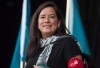 Federal Justice Minister Jody Wilson-Raybould waits to speak after the Walk for Reconciliation in Vancouver, B.C., on Sunday, September 24, 2017. Wilson-Raybould in her Vancouver Granville riding say they're disappointed by the decision of government MPs to eject her from the Liberal caucus but they would back her in the upcoming election if she ran as an Independent. THE CANADIAN PRESS/Darryl Dyck