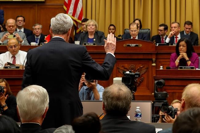 Former special counsel Robert Mueller is sworn in by House Judiciary Committee Chairman Jerrold Nadler, D-N.Y., to testify before the House Judiciary Committee hearing on his report on Russian election interference, on Capitol Hill, Wednesday, July 24, 2019 in Washington. (AP Photo/Alex Brandon)