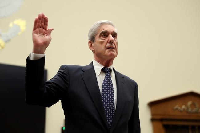 Former special counsel Robert Mueller, is sworn in before he testifies before the House Judiciary Committee hearing on his report on Russian election interference, on Capitol Hill, in Washington, Wednesday, July 24, 2019. (AP Photo/Andrew Harnik)