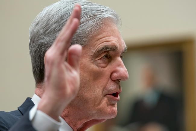 Former special counsel Robert Mueller is sworn in to testify to the House Judiciary Committee about his investigation into President Donald Trump and Russian interference in the 2016 election, on Capitol Hill in Washington, Wednesday, July 24, 2019. (AP Photo/J. Scott Applewhite)