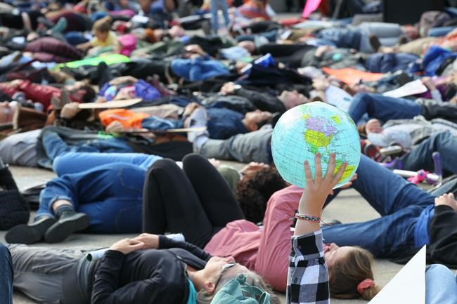 Climate change activists and students gather for a protest and