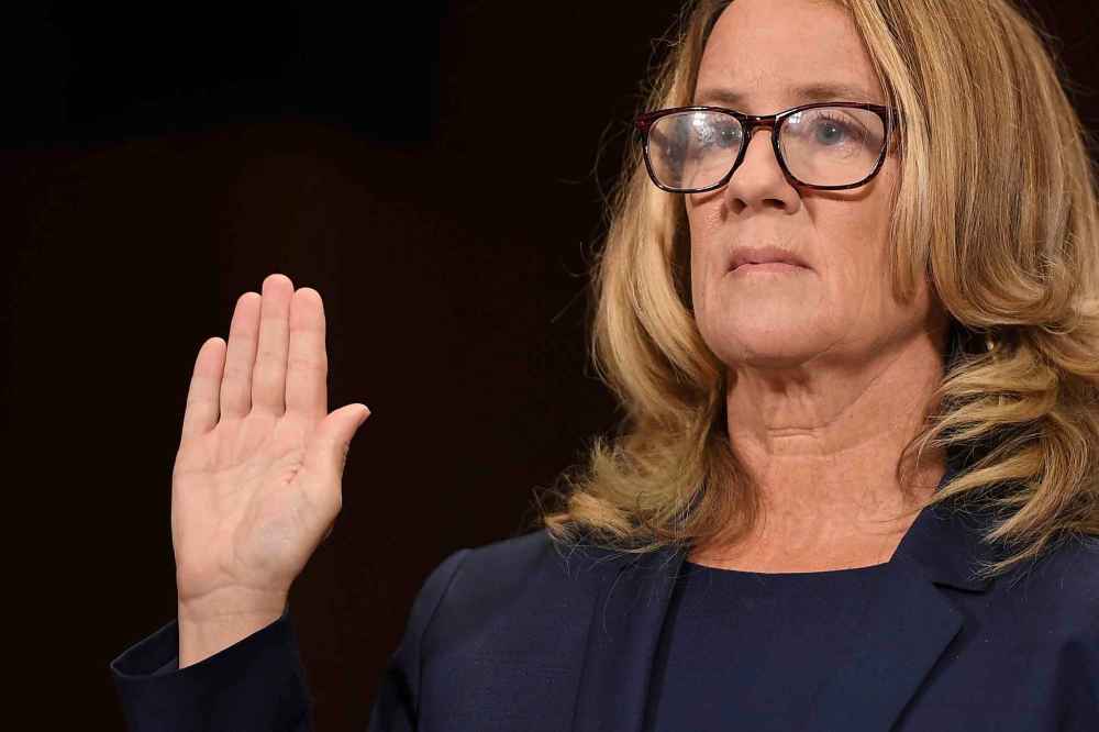 Christine Blasey Ford is sworn in to testify before the Senate Judiciary Committee on Capitol Hill in Washington, on Sept. 27. (Saul Loeb / Pool / Associated Press files)
