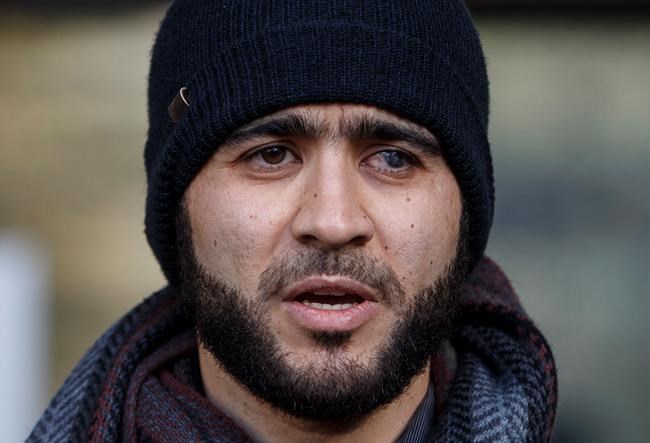 Omar Khadr speaks outside court in Edmonton on Thursday, December 13, 2018. Khadr is seeking a Canadian passport to travel to Saudi Arabia and wants permission to speak to his sister. THE CANADIAN PRESS/Jason Franson