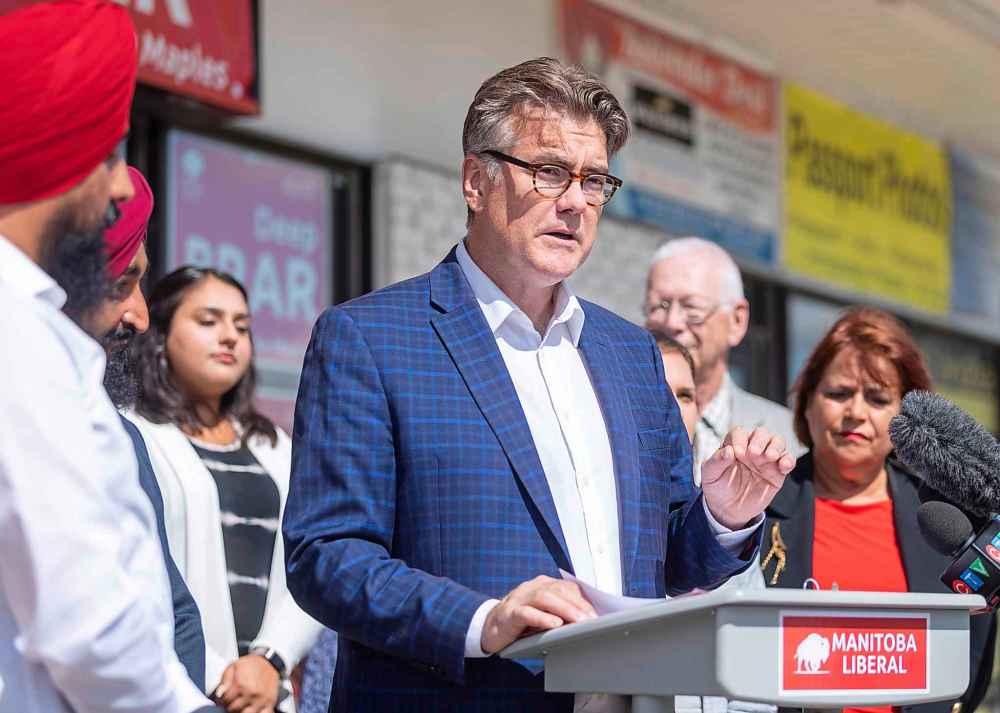 SASHA SEFTER / WINNIPEG FREE PRESS
Dougald Lamont, Leader of the Manitoba Liberal Party makes a policy announcement alongside Liberal candidate for The Maples Deep Brar outside Brar’s campaign headquarters Thursday afternoon.