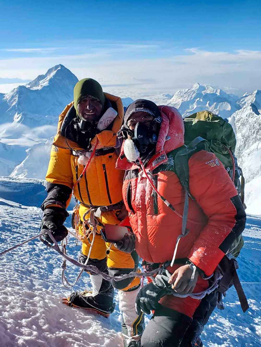 Shekhawat, left, with his sherpa Mingma Thindu Sherpa, at the summit of Everest. Shekhawat is a special education teacher at St. Amant who climbed the peak to raise money for the St. Amant Foundation.