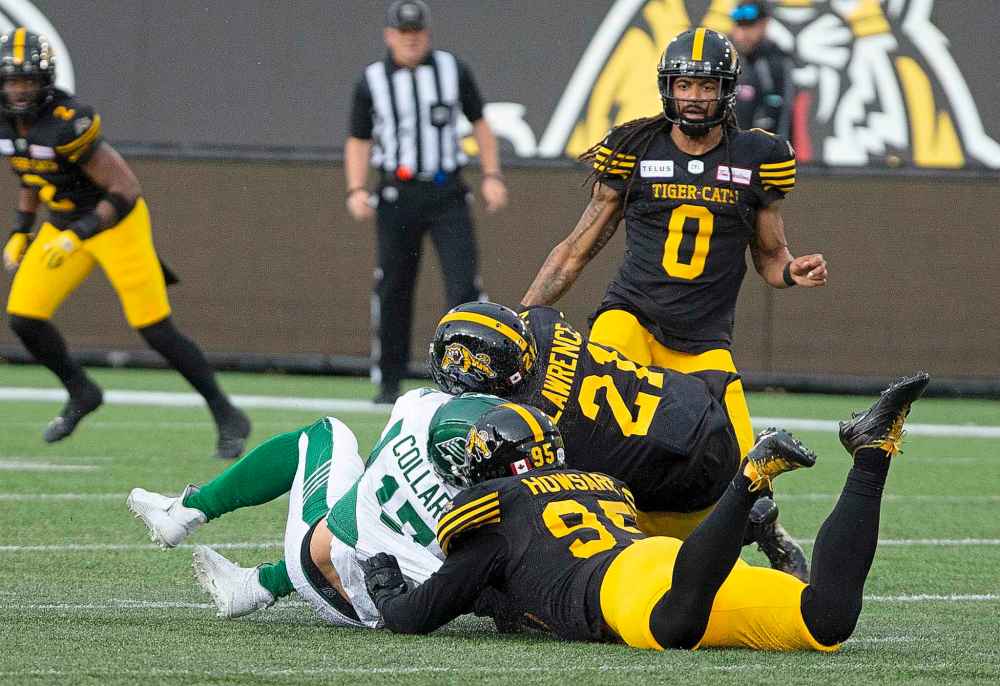 Zach Collaros got a concussion because of this late hit by Simoni Lawrence, who was suspended for two games, while Collaros didn't play again until he joined the Bombers a few weeks ago. (Peter Power / The Canadian Press files)