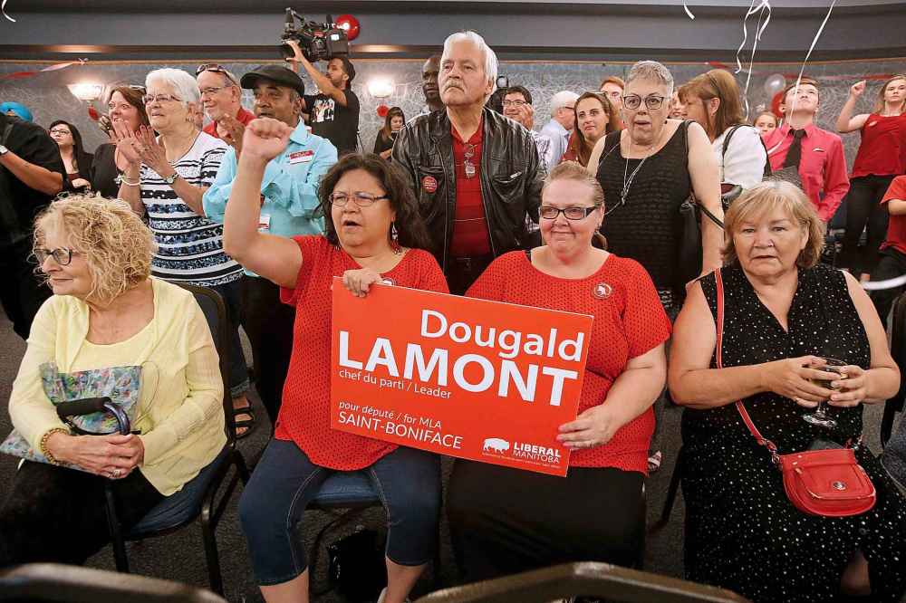 JOHN WOODS / WINNIPEG FREE PRESS
Supporters celebrate as they see positive results come in for Dougald Lamont, leader of the Manitoba Liberal Party, in the St. Boniface byelection Tuesday.