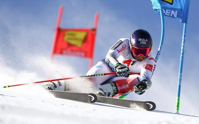 France's Mathieu Faivre speeds down the course during an alpine ski, men's World Cup giant slalom in Soelden, Austria, Sunday, Oct. 27, 2019. (AP Photo/Marco Trovati)