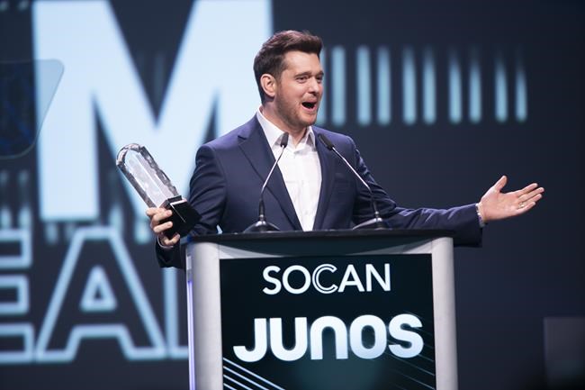 Michael Buble accepts the Adult Contemporary Album of the Year at the Juno Gala Dinner and Awards in London, Ontario, Saturday, March 16, 2019. THE CANADIAN PRESS/ Geoff Robins
