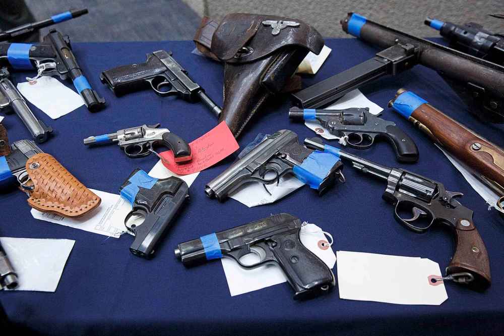 MIKE DEAL / WINNIPEG FREE PRESS
A number of the guns handed over during June�s gun amnesty program were on display at the RCMP �D� Division Headquarters for a wrap-up press conference with Heather Stefanson, Minister of Justice and Attorney General for the Province of Manitoba and RCMP Commanding Officer Assistant Commissioner Scott Kolody, President of the Manitoba Association of Chiefs of Police Tuesday afternoon.
180731 - Tuesday, July 31, 2018.