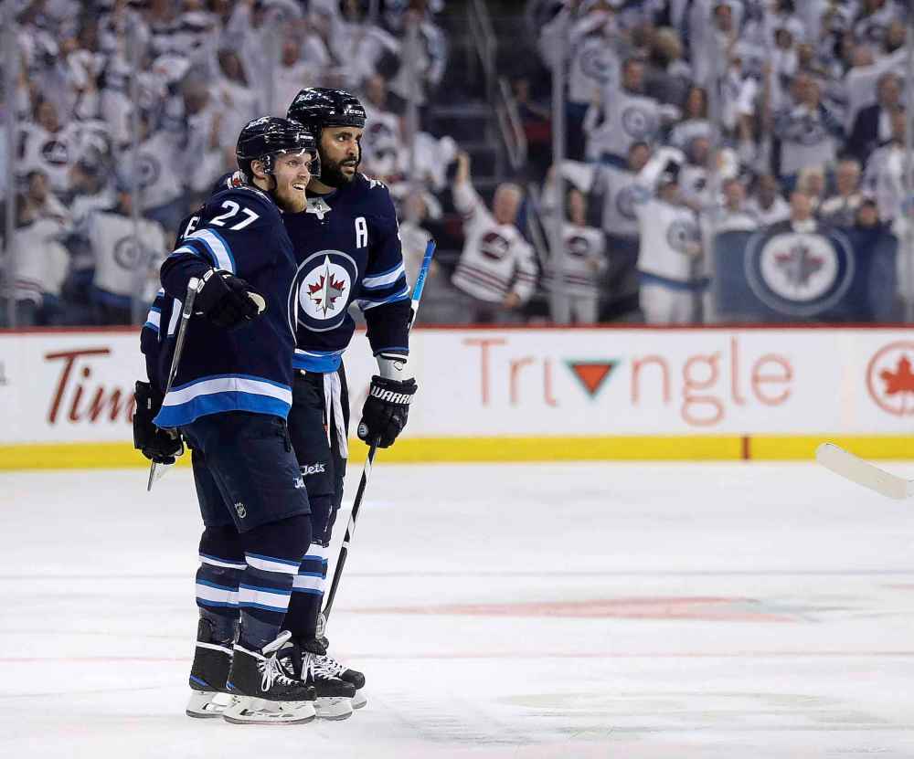The Jetsare dealing with their own injury troubles with both Dustin Byfuglien (33) and Nikolaj Ehlers (27) on injury reserve; neither is expected back before the beginning of February at the earliest. (Trevor Hagan / The Canadian Press files)