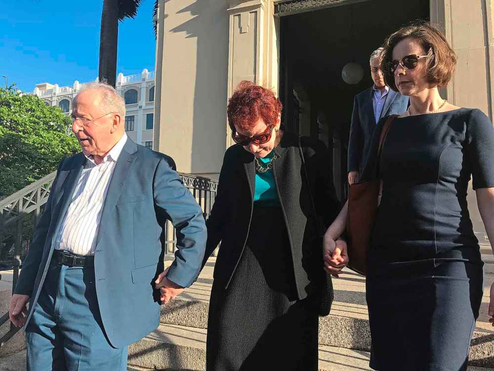 Claude Adams photo
Adam Anhang's father Abe, mother Barbara and younger sister Rebecca leave old San Juan Court after Aurea Vazquez-Rijos's life sentence was ordered on Friday.