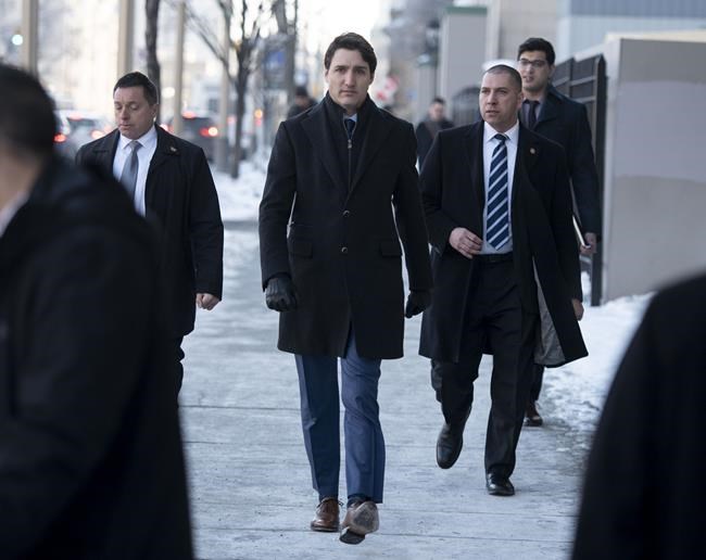 Prime Minister Justin Trudeau walks to the National Press Theatre in Ottawa to deliver remarks on Thursday, March 7, 2019. THE CANADIAN PRESS/Justin Tang