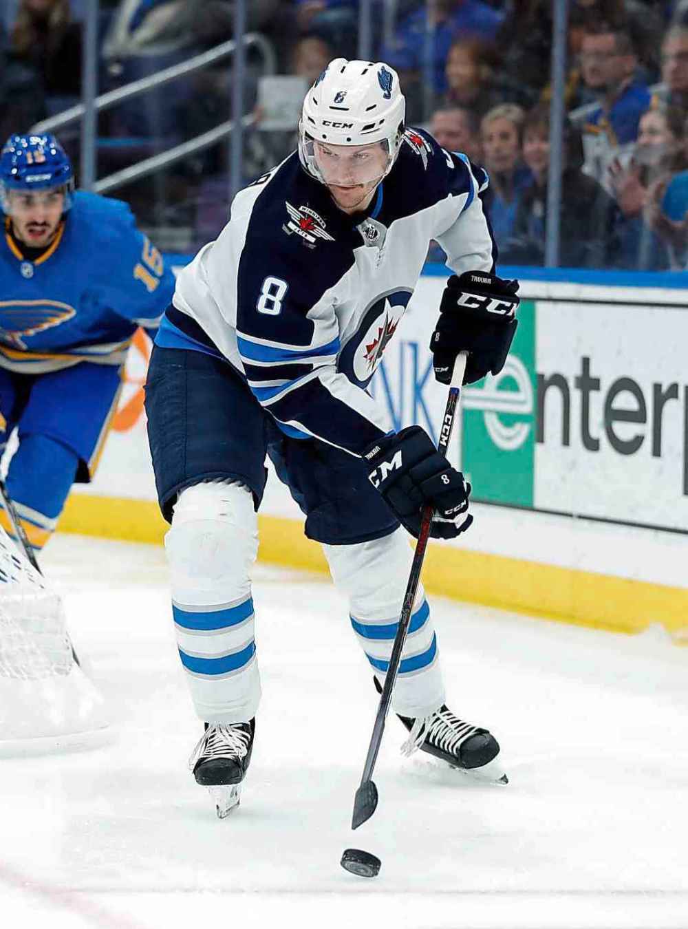 CP
Winnipeg Jets' Jacob Trouba (8) passes the puck as St. Louis Blues goaltender Chad Johnson, left, and Robby Fabbri defend during the first period of an NHL hockey game Saturday, Nov. 24, 2018, in St. Louis. (AP Photo/Jeff Roberson)