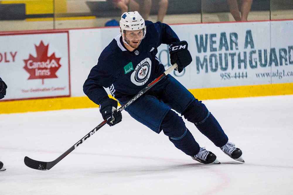 MIKE DEAL / WINNIPEG FREE PRESS
Winnipeg Jets' Jacob Trouba (8) takes part in a pre-season skate at the BellMTS IcePlex Monday morning.
180910 - Monday, September 10, 2018.