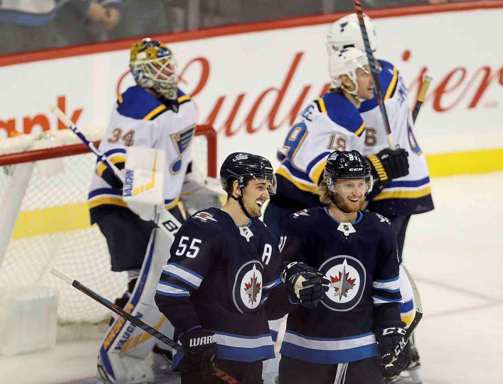 THE CANADIAN PRESS/Trevor Hagan
Winnipeg Jets' Mark Scheifele and Kyle Connor celebrate after Scheifele scored on St. Louis Blues goaltender Jake Allen during the first period.