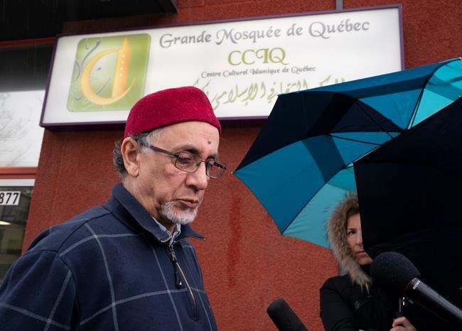 Quebec Islamic cultural centre president Boufeldja Benabdallah takes a moment before reacting to the deadly shooting in New Zealand, Friday, March 15, 2019 in Quebec City. THE CANADIAN PRESS/Jacques Boissinot