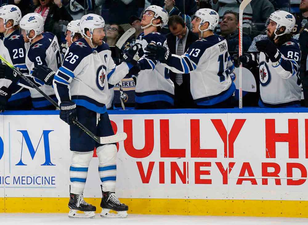 Captain Blake Wheeler bounced back from a couple of sub-par games by scoring the winner in Buffalo with under four mintues left and setting up Mark Scheifele's empty netter. (Jeffrey T. Barnes / The Associated Press)