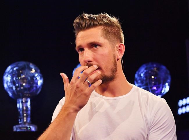 Austria's ski star Marcel Hirscher speaks during a press conference announcing the end of his skiing career in Salzburg, Austria, Wednesday, Sept.4, 2019. (AP Photo/Kerstin Joensson)