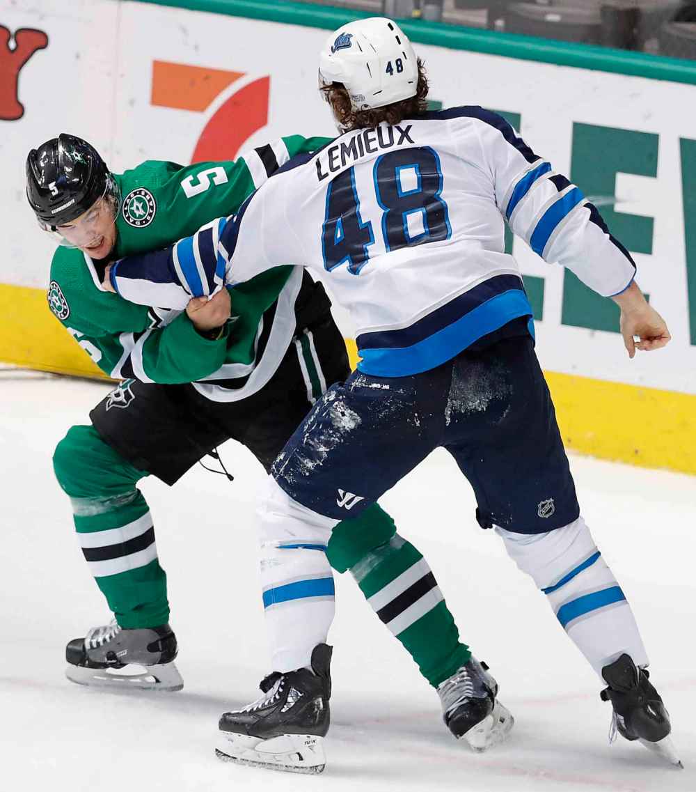 (AP Photo/LM Otero)
Lemieux, right, and Dallas Stars defenceman Connor Carrick fight during their game in Dallas in January.