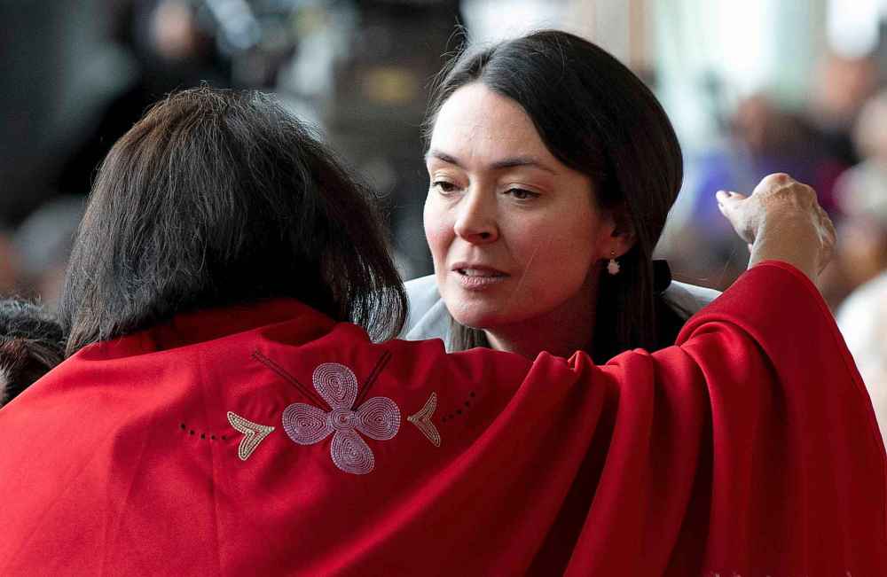CP
A woman embraces Commissioner Qajaq Robinson during ceremonies marking the release of the Missing and Murdered Indigenous Women report in Gatineau, Monday. THE CANADIAN PRESS/Adrian Wyld